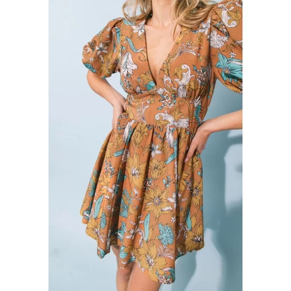 floral mini dress in rust with puff sleeves