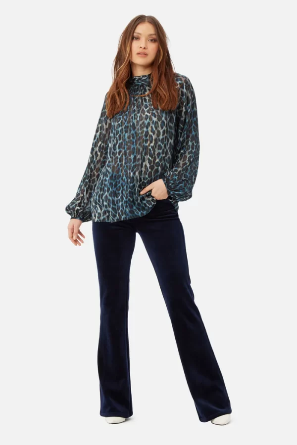 animal print moments top in blue at the boutique