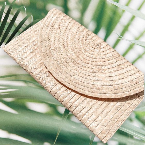 Handwoven Palm Clutch At The Boutique..