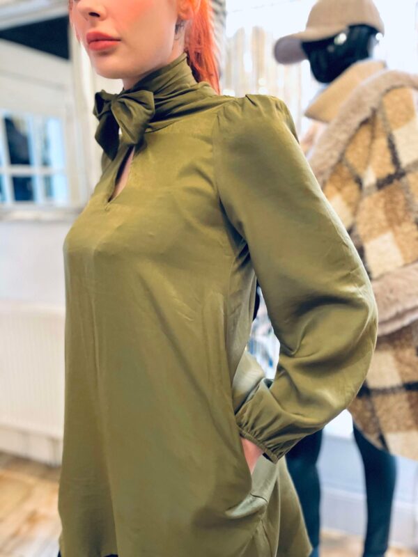 green tinder dress at the boutique